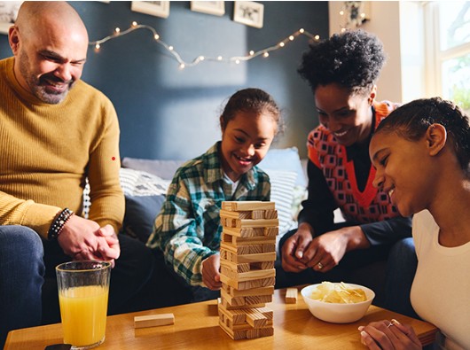 Grandparents playing a game with their grandchildren